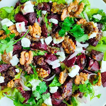 Summer Glo Salad - Fresh Beets, roasted almonds and zesty citruis dressing